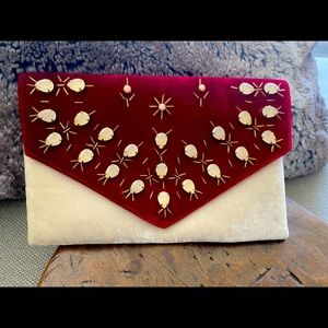 Burgundy and Ivory clutch. New. Brand: Shiraleah